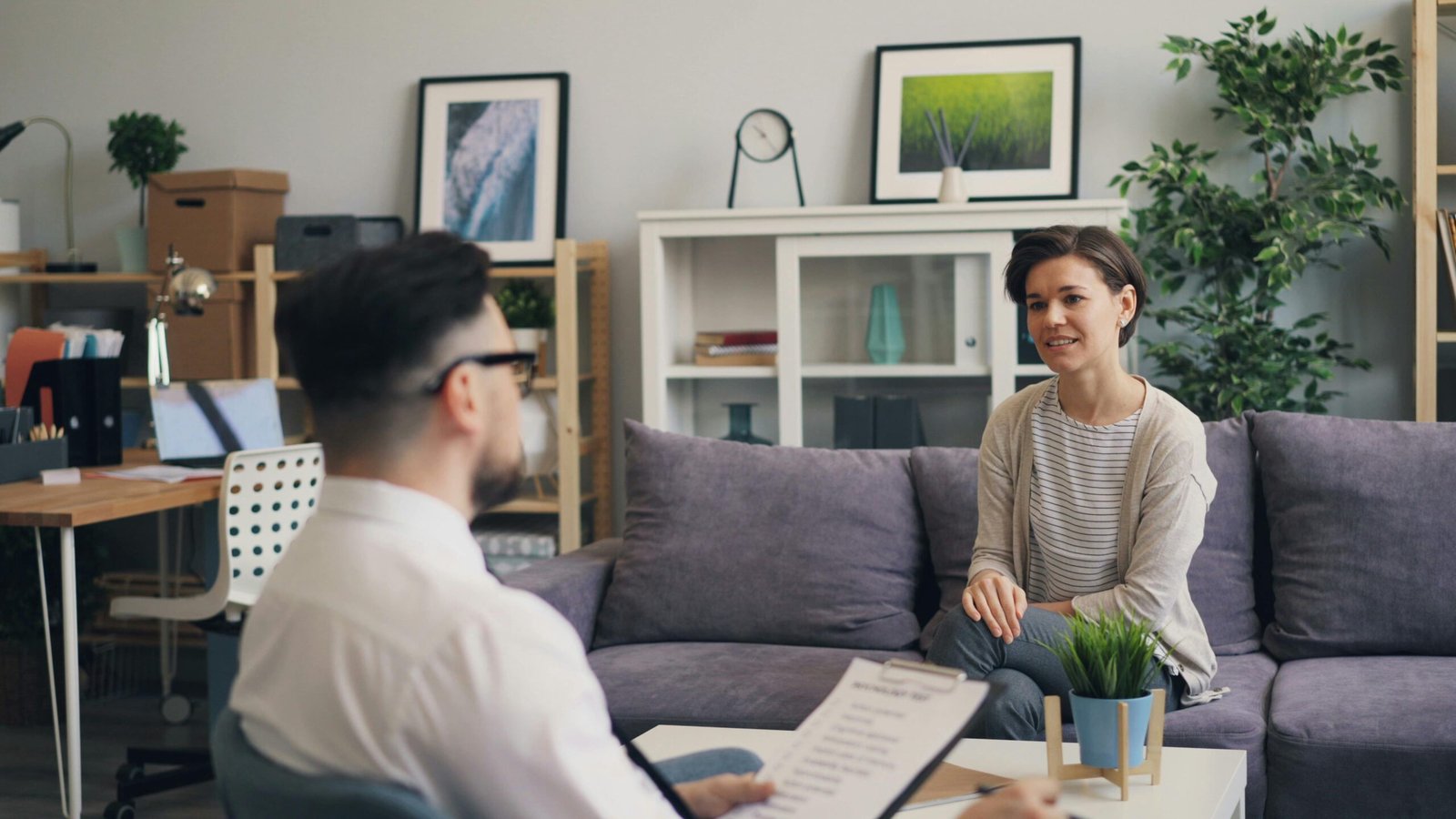 gas-pipeline A therapist and client in a modern, relaxing office setting.